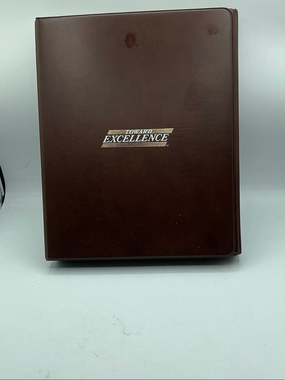 Toward Excellence Brown Presentation Binder